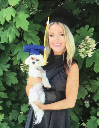 Dr. Sam Bahan DC graduation with her dog Brady | Natural Health Heals